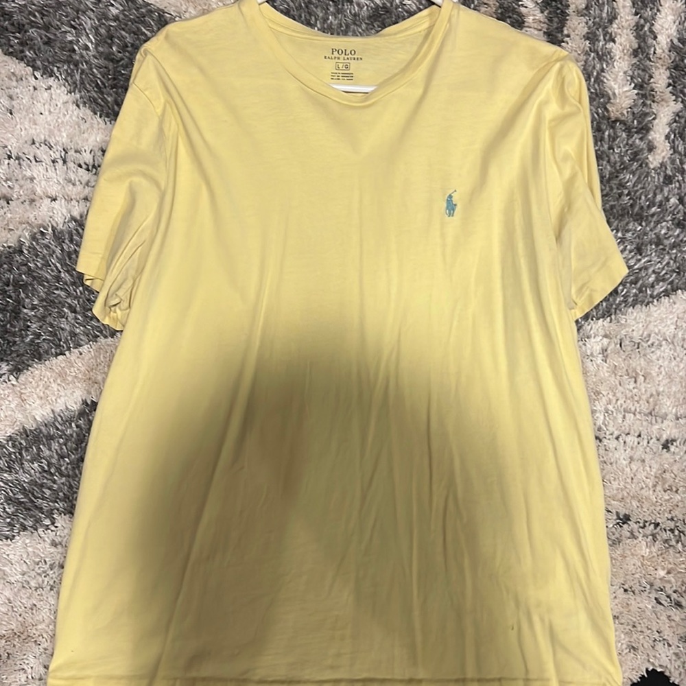 Yellow Polo t shirt. Large. Small hole (see picture).